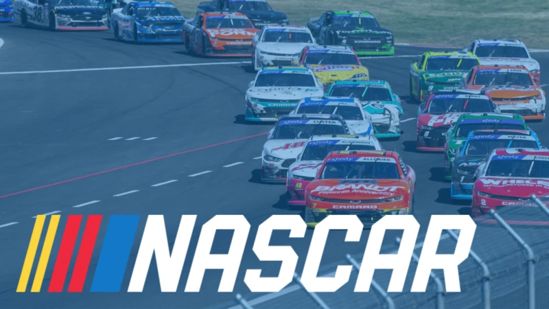A photo of NASCAR cars on a track with the NASCAR logo in the bottom left corner.