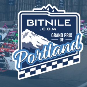 A photo of the Grand Prix Cars on the track with the Grand Prix of Portland Logo on the Right Side of the image.