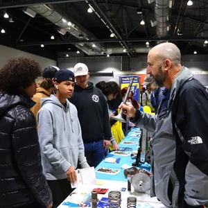 Student listening to general contactor at CIEF Trades day.