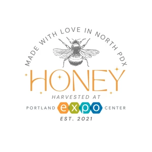Portland Expo Center honey label with a bee illustration. Reads: Made with Love in North PDX. Honey harvested at Portland Expo Center, est. 2021.