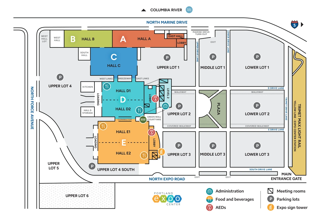 The Portland Expo Center is bordered by North Force Avenue (west), North Marine Drive and the Columbia River (north), I-5 and the TriMet Expo Center Station (east), and North Expo Road (south). It has 5 main exhibit halls—Halls A and B in the north, and Halls C, D, and E to the south. Seven parking lots surround the site; Upper Lot 4 on the west provides direct loading dock access. A small greenspace called The Plaza lies east of Hall D, between Upper and Lower Lot 2.